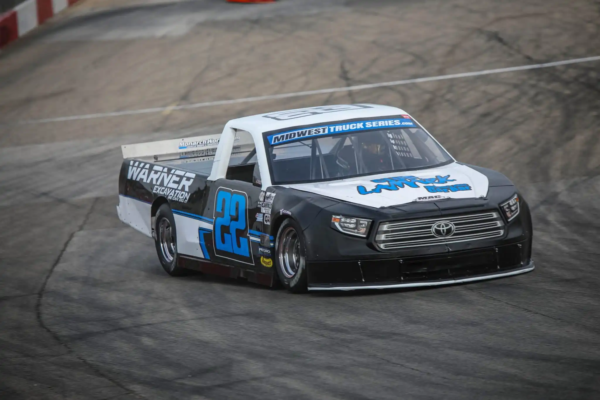 Austin Warner driving the number 22 truck on track at Jefferson