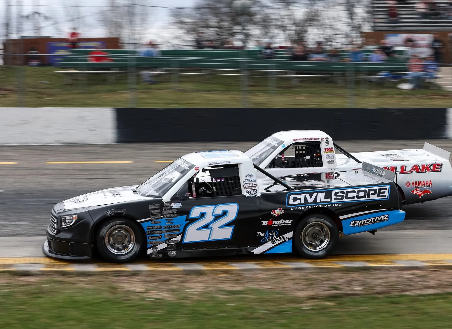 Austin Warner driving the number 22 truck on track